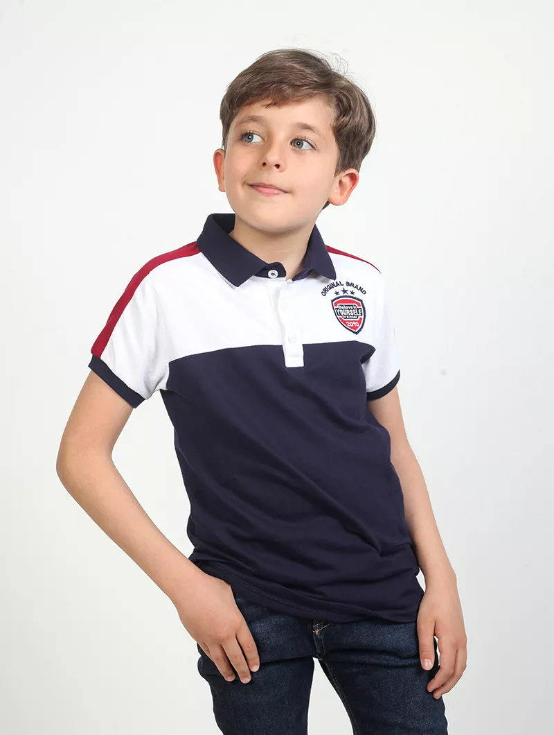 Polo garçon avec badge